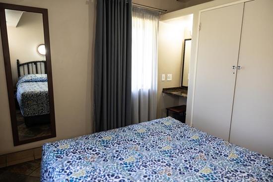 Warmbaths, A Forever Resort: 6-Sleeper Chalet. 2 bedrooms (1 double bed, 2 single beds & 1 double sleeper couch)